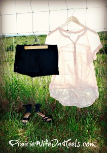 Sheer Blouse and Black Shorts