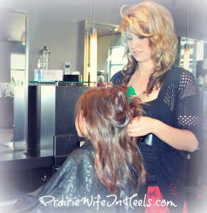 Hairstylist doing little girls hair