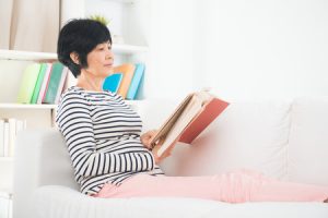 woman reading book