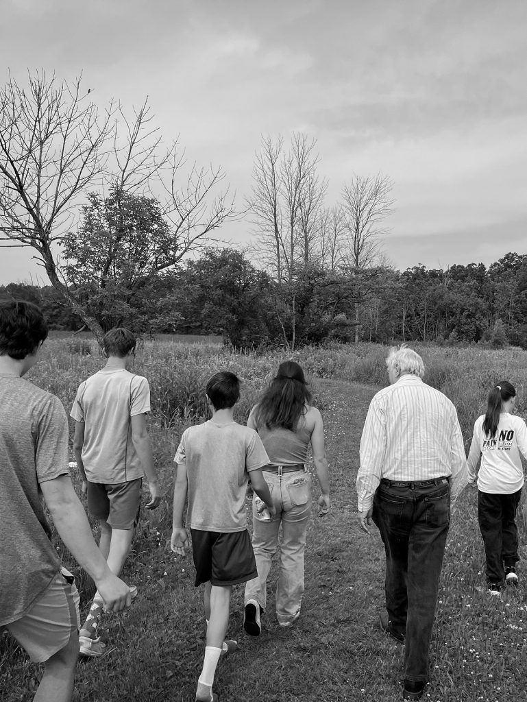 Dad walking with The Cowkids outside of hospice.
